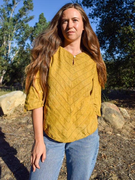 Marigold Embroidered Pointed Hem Blouse